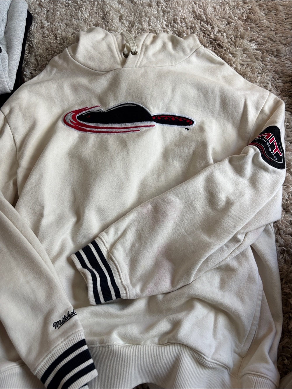 Mitchell & Ness Cream Crewneck Sweatshirt with Black & Red Logo
